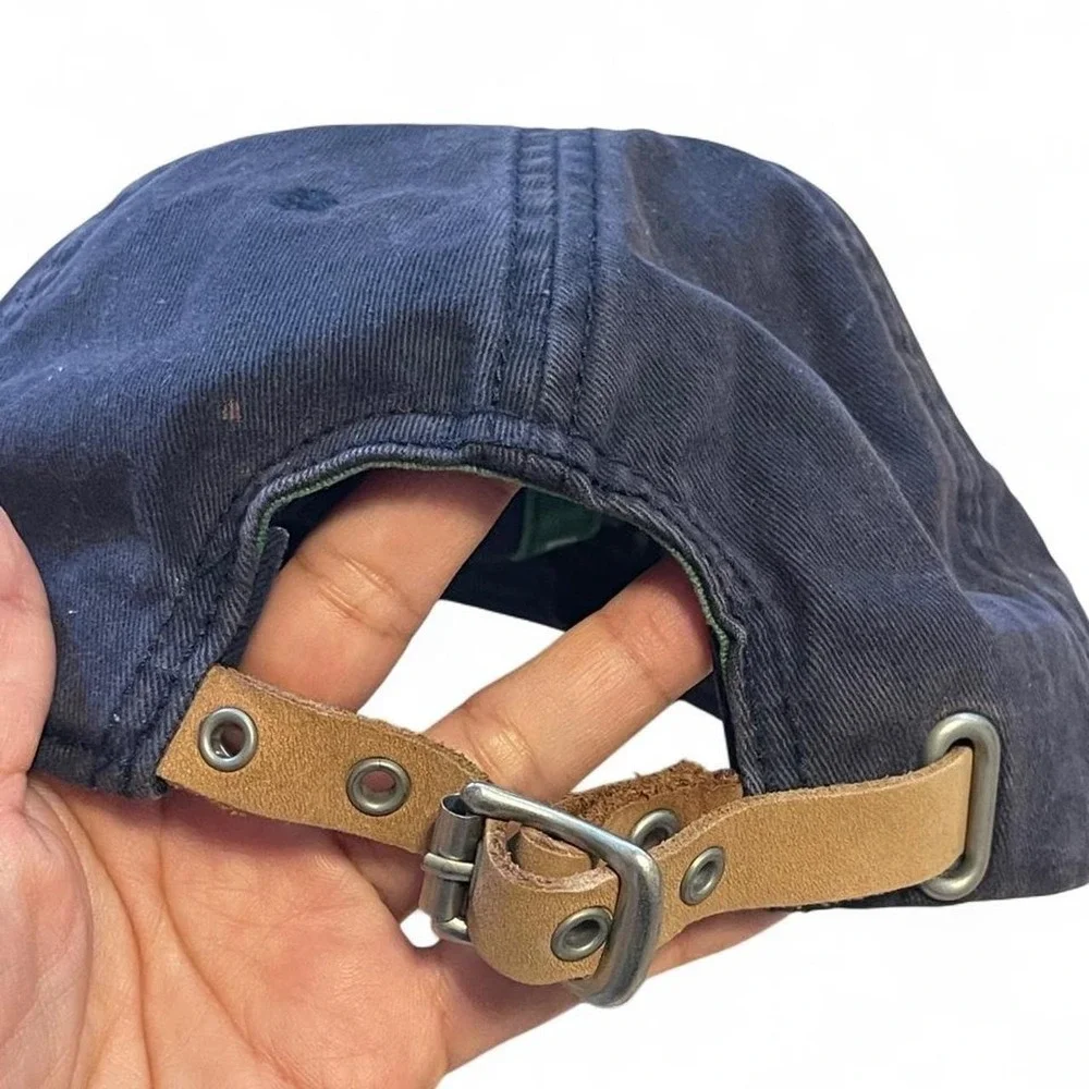 Navy blue Lacoste baseball cap with green croc logo